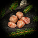 Aurinkokivi, rumpuhiottu