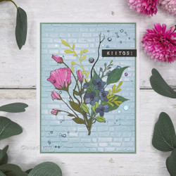 Käsitellen leimasin Dymo-tekstit