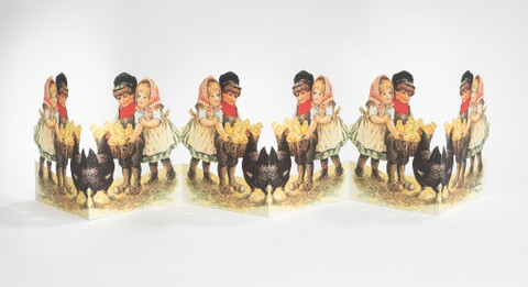 Jenny Nyström lapset ja kananpoikia korissa. 