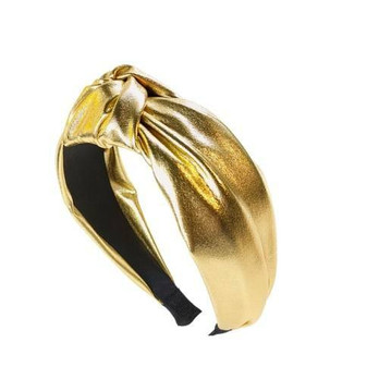 Hiuspanta hohtava kulta