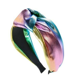 Hiuspanta hohtava vaalea sateenkaari