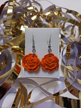 Oranssit ruusu korvakorut