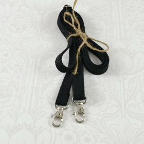 Olkahihna musta puuvillaa