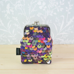 Paljetti -tuplakukkaro