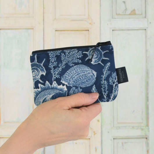 Koralli -vetoketjukukkaro