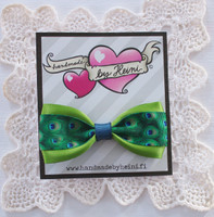 Rusettipinni Riikinkukko, vihreä