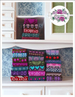 Kahdeksan neuleohjeen setti