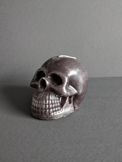Black beeswax skull candle 