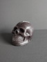 Black beeswax skull candle 