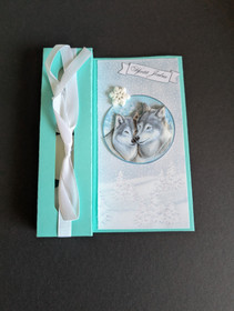 Jouluinen kynttiläkortti susi