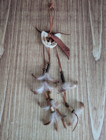 Moose bone feather ornament