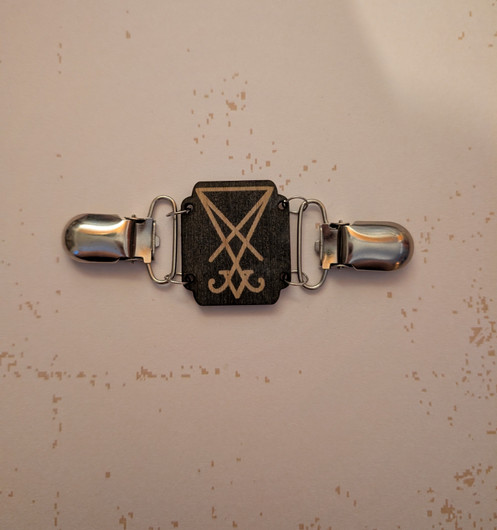 Sweater clip with lucifer