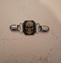 Sweater clip with skull 