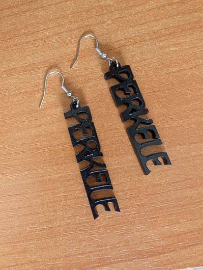 Mustat Perkele korvakorut 