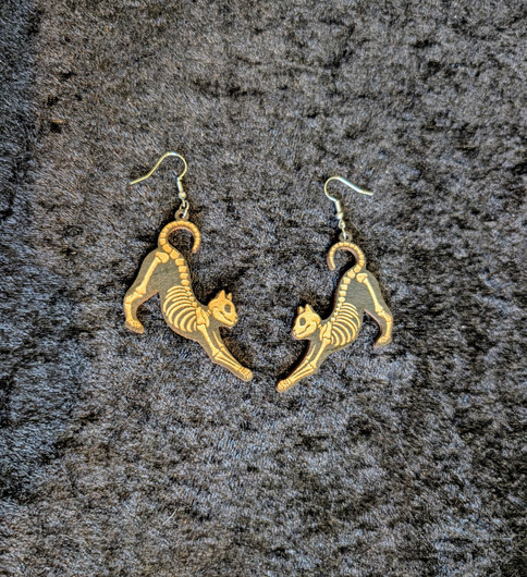 Skeleton cat earrings