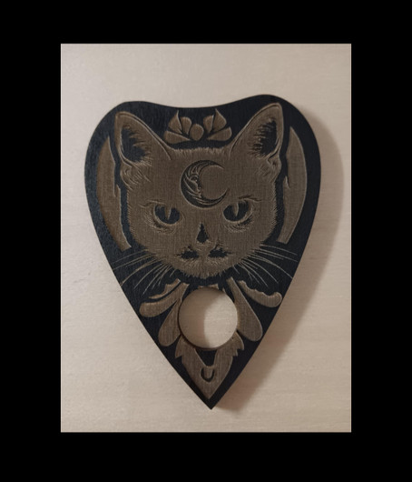 Ouija board cat + planchette