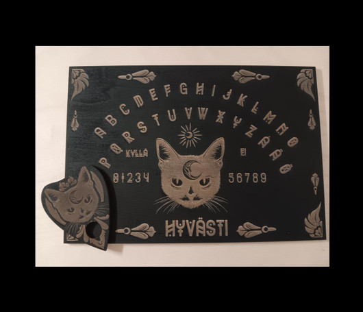 Ouija board cat + planchette