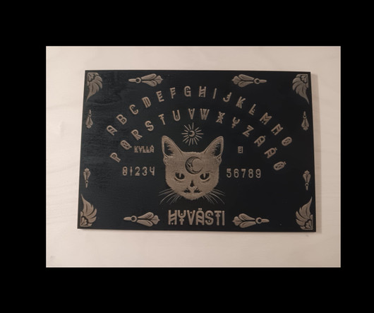 Ouija board cat + planchette