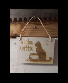 Kyltti Noidan keittiö kissa