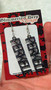 Black glitter perkele earrings 