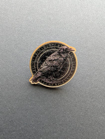 Wooden round raven pin