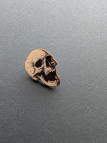 Wooden skull pin