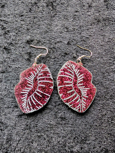 Red lip earrings from test batch to depreciation cost