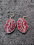 Red lip earrings from test batch to depreciation cost