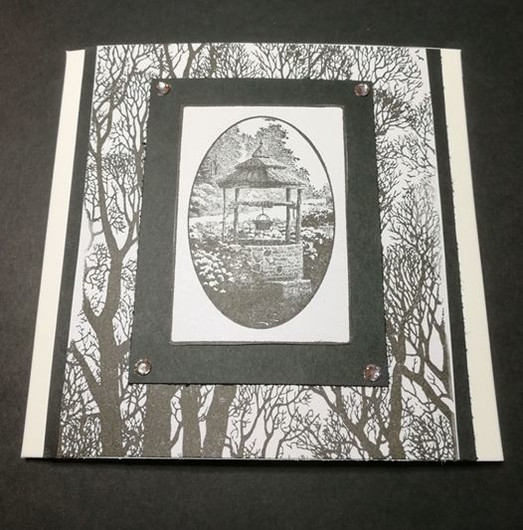Postcard with a well