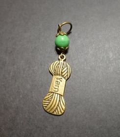 Silmukkamerkki lankakerä vihreä helmi