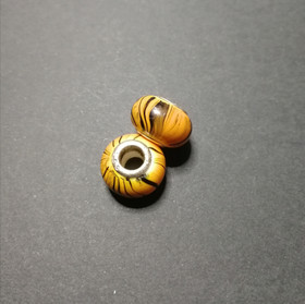 Orange swirly dread bead
