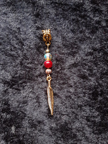 Rastakoru kultainen sulka