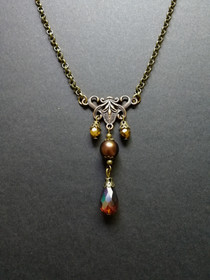 Ruskea pisara kaulakoru 