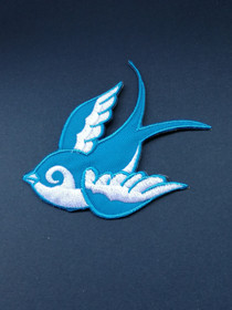 Kangasmerkki sininen lintu 