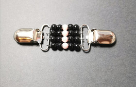 Black, light red and bronze sweater clip