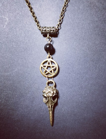 Bird skull necklace with pentagram
