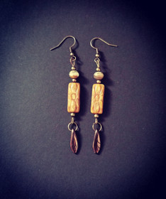 Ruskean sävyiset kukka korvakorut 