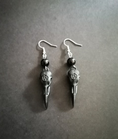 Korpinkallo korvakorut pentagrammilla 