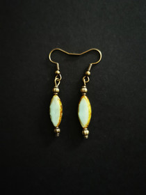 Vihertävät korvakorut