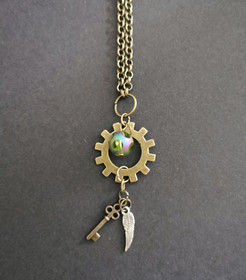 Gear necklace with key and wing