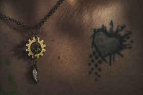 Gear necklace with key and wing