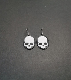Black and white skull earrings