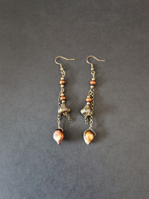 Korvakorut ketju ja simpukka 