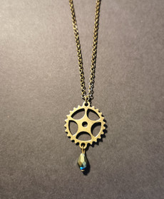 Gear necklace with green drop