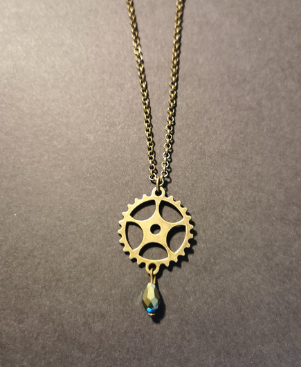 Gear necklace with green drop