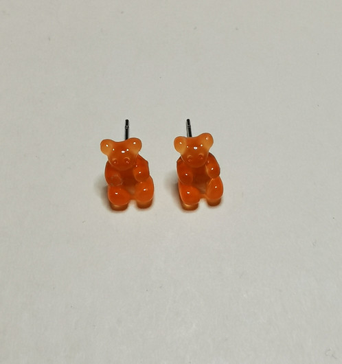 Nappikorvakorut oranssit nallekarkit 