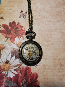 Steampunk necklace with clockwork