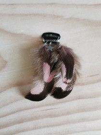 Hiussulka koru tähdellä