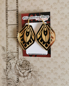 Art deco korvakorut kaiverruksilla