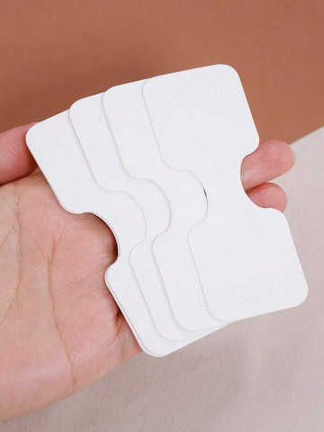 Korujen esillelaitto pahveja 50kpl valkoinen